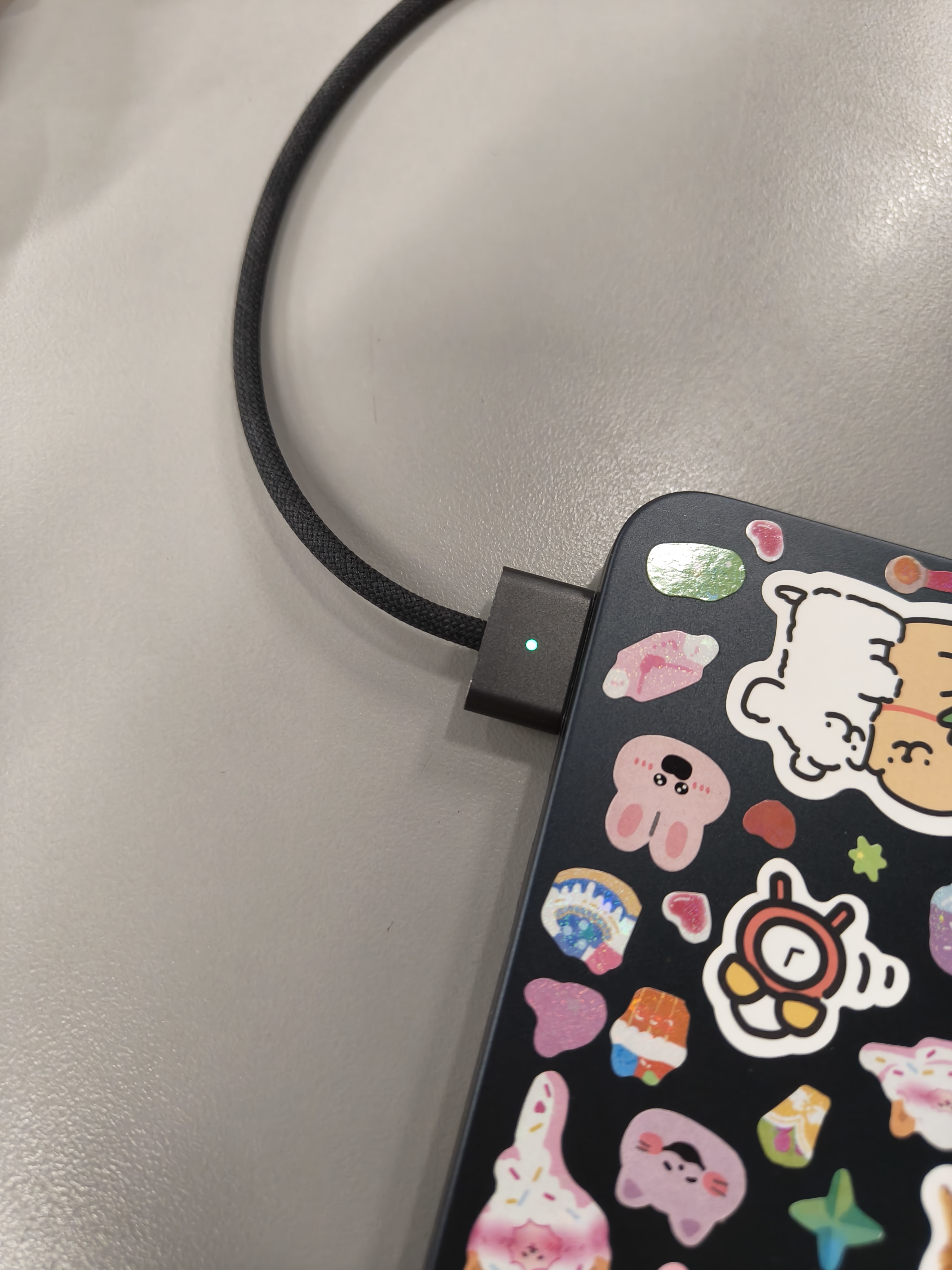 The sound of charger charging the laptop