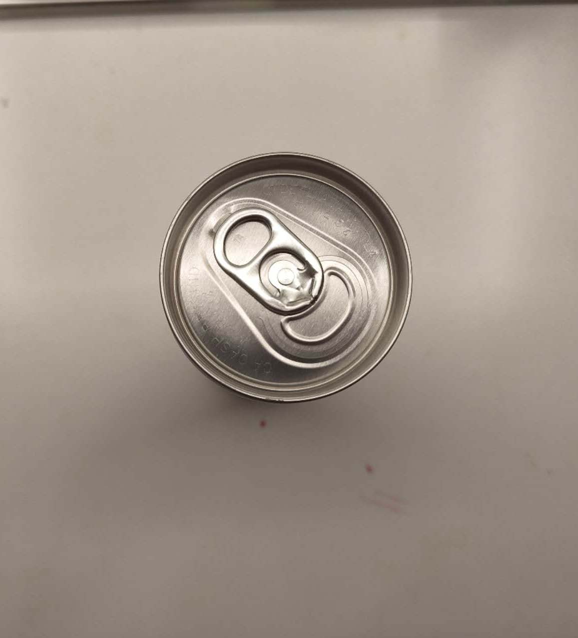 This is a high angle shot image of a can of drink