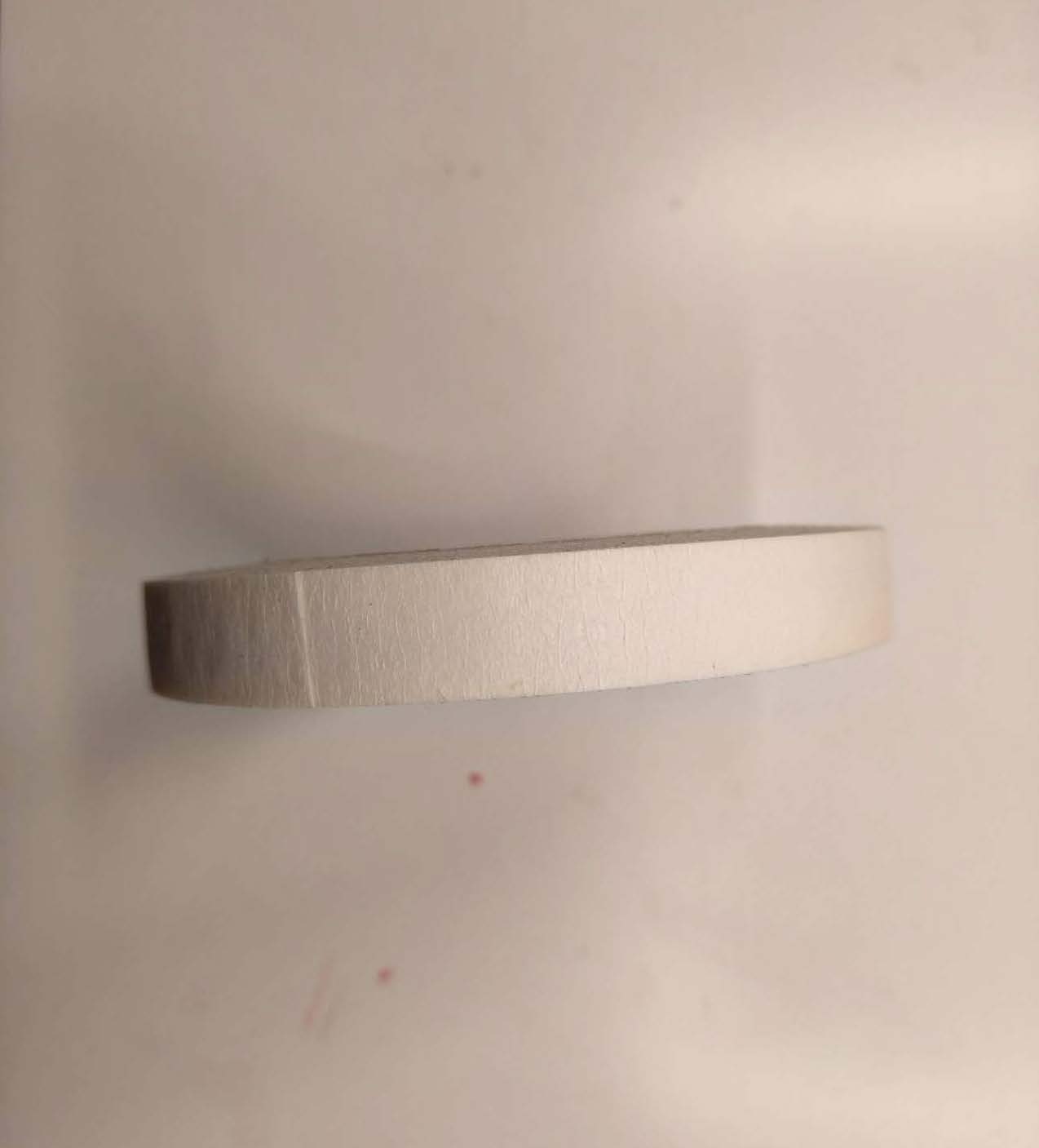 This is a side shot image of a roll of tape