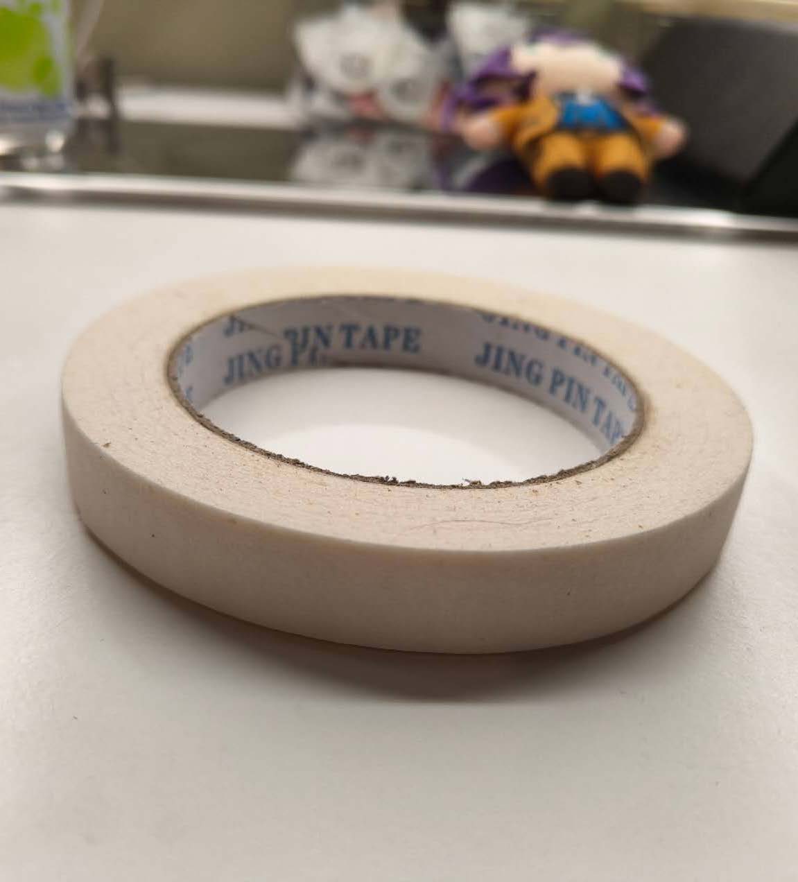 This is a side shot image of a roll of tape