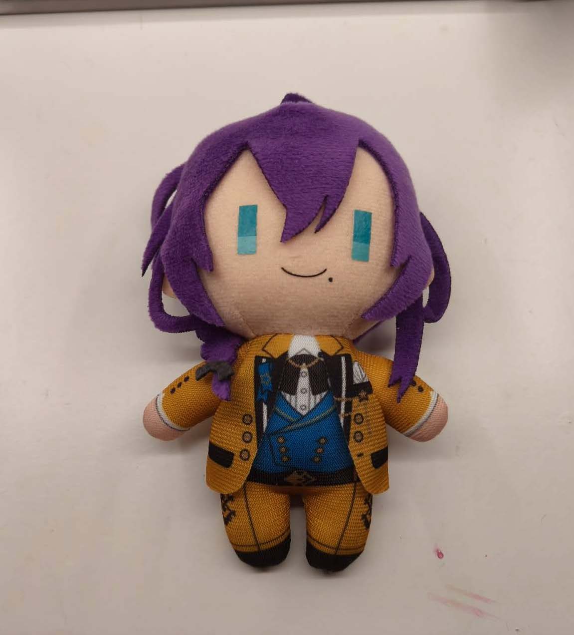 This is front shot image of a cotton doll